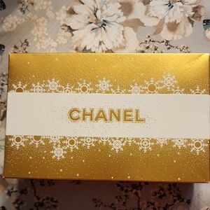 CHANEL Elegant Gold Box with White Accents